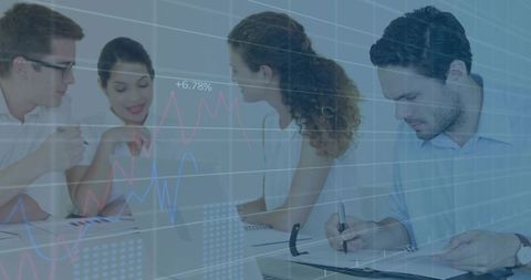 Collaborating team analyzing financial data on laptop with chart overlay visualization