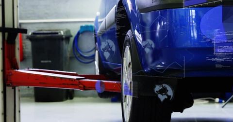 Lifting glossy blue car on red hydraulic hoist in garage with digital diagnostics overlays