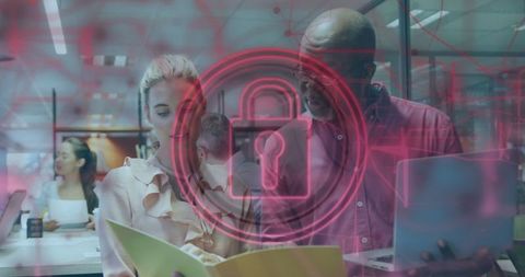 Office colleagues reviewing documents with digital security icon