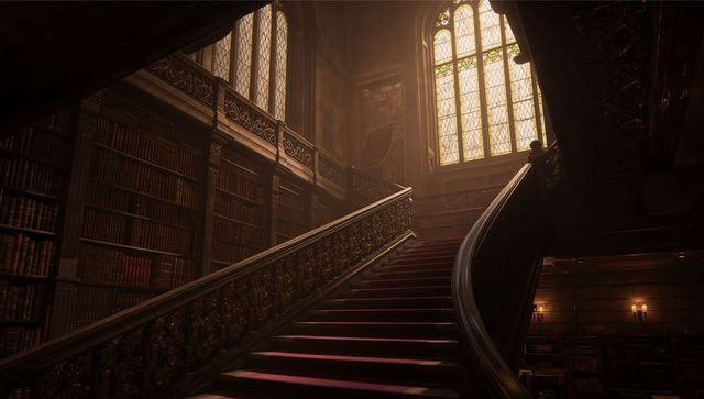 Grand curved library staircase with gilded balustrade, red carpet and stained glass light