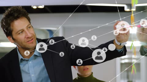 Businessman Visualizing Digital Networking in Modern Office