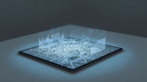 Tablet Hologram Display of Futuristic Cityscape