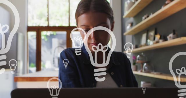 Young Woman Innovating Ideas at Laptop with Light Bulb Icons - Download Free Stock Images Pikwizard.com