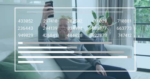 Smiling Businessman Using Smartphone with Data Overlay