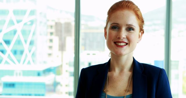 Confident Businesswoman Standing in Modern Office with City View - Download Free Stock Images Pikwizard.com