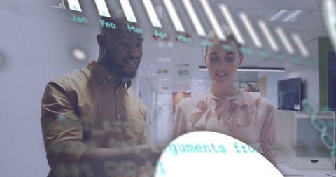 Representing a forward-thinking business environment, diverse professionals examine digital financial data. Perfect for illustrating modern business analysis, teamwork, and the integration of technology in office settings.