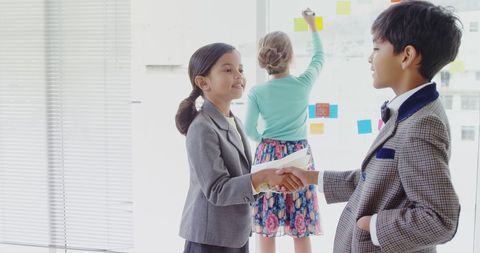 Children Collaborating in Educational Classroom Activity