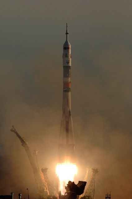 Soyuz TMA-8 rocket launches from Baikonur Cosmodrome in Kazakhstan, marking the beginning of Expedition 13 mission. Mission Commander Pavel Vinogradov and Flight Engineer Jeffrey Williams are joined by Marcos Pontes from Brazilian Space Agency. Potential usage includes promoting space exploration, NASA mission archives, inspirational posters, educational materials, and historical documentation.