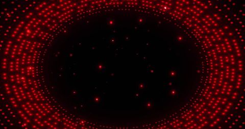 Luminescent red circles on black background creating dynamic movement