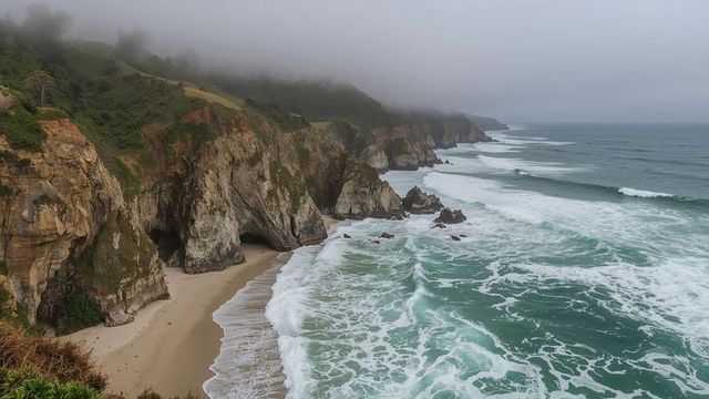 Moody Coastal Scene with Cliffside Coves and Crashing Waves