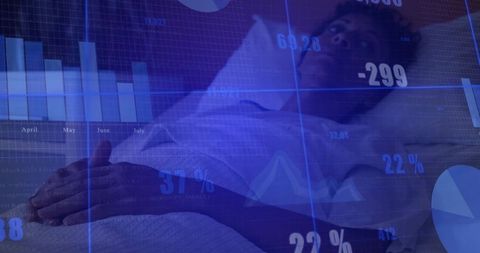 Patient Resting on Hospital Bed with Data Visualizations Overlaid