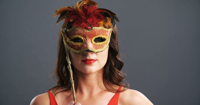 Woman Wearing Feathered Mask for Masquerade or Carnival Event - Download Free Stock Images Pikwizard.com