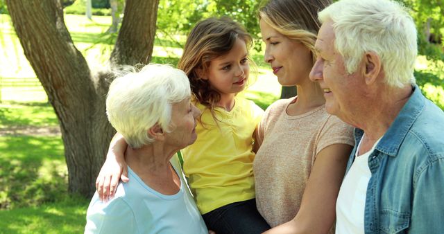 Happy Family Gathering in Sunny Park with Smiling Generations - Download Free Stock Images Pikwizard.com