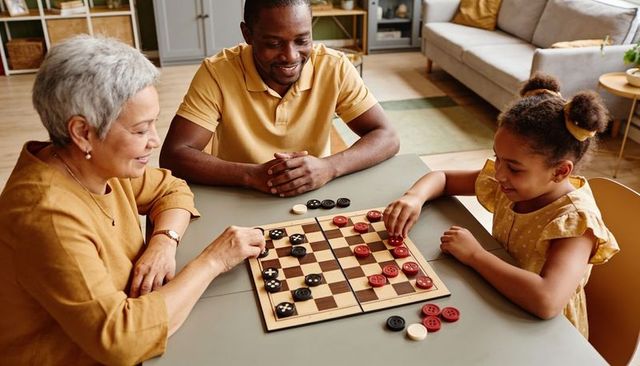 Playing checkers together: multigenerational family bonding over cozy home game night