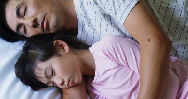 Father Sleeping Peacefully with Daughter in Bed - Download Free Stock Images Pikwizard.com