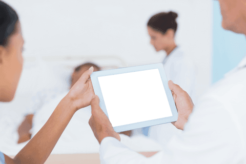 Healthcare Professionals Utilizing Transparent Digital Tablet with Blurred Background - Download Free Stock Videos Pikwizard.com