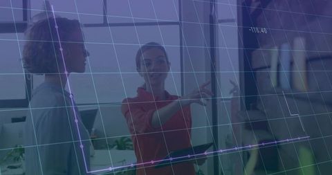 Businesswomen Using Digital Screen for Team Planning