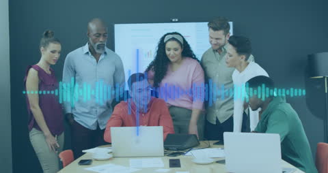 Diverse Team Collaborating on Digital Data Visualization in Office