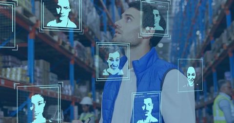 Warehouse worker scanning inventory with handheld scanner and holographic AI overlays