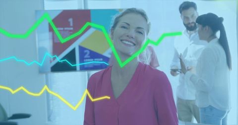 Successful Business Team Analyzing Market Trends in Modern Office