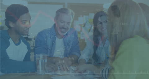 Diverse Team Collaborating in Business Meeting with Financial Overlay