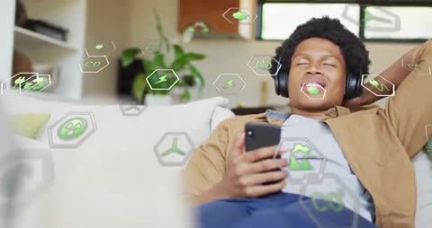 Person Relaxing with Eco-Friendly Technology Concepts