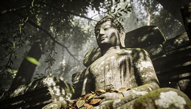 Moss-covered stone buddha in misty jungle ruins receiving dappled sunlight and lichen texture