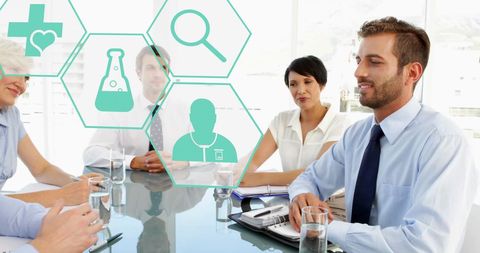 Diverse business team meeting with healthcare icons