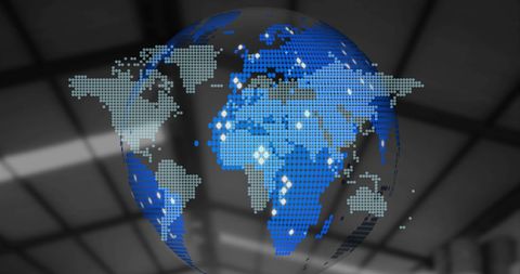 Futuristic pixelated world globe in industrial setting