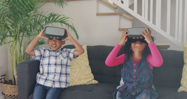 Children Experiencing Virtual Reality at Home, Smiling and Engaged - Download Free Stock Images Pikwizard.com