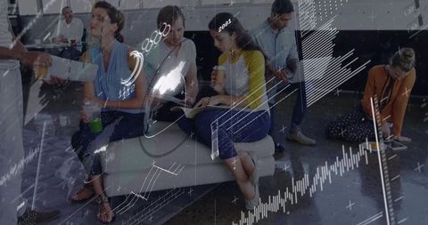 Business team collaborating in lounge with tablets, notebooks and analytics overlays