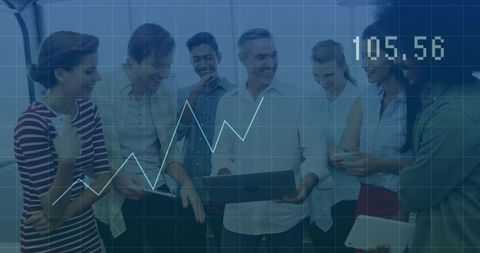 Diverse business team analyzing positive market trends on devices