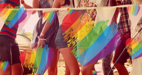 Colorful Pride Celebration with Diverse Group of People and Rainbow Hearts - Download Free Stock Images Pikwizard.com