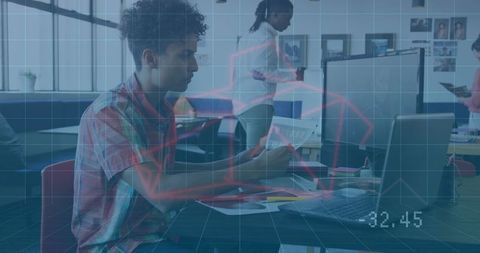 Young professional reviewing financial analytics on laptop in coworking hub with red chart