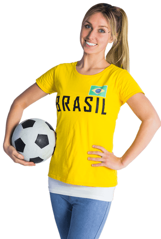 Smiling woman holding soccer ball in transparent brazil shirt