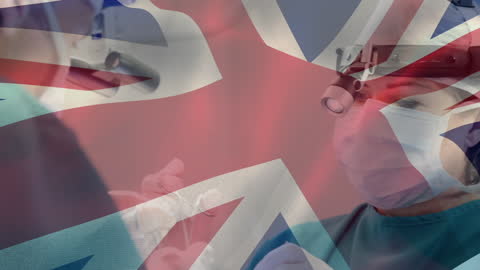 British Healthcare Concept with Surgeons Performing an Operation