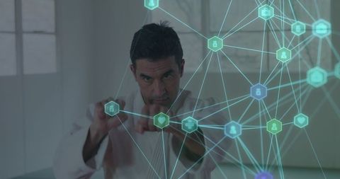 Engineer interacting with futuristic holographic network interface showing health data