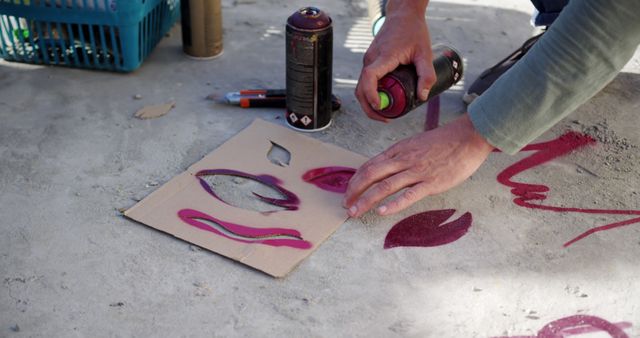 Artist Using Spray Paint Stencil Creating Street Art - Download Free Stock Images Pikwizard.com