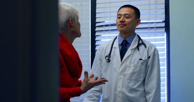 Doctor Discussing Health Concerns With Elderly Patient - Download Free Stock Images Pikwizard.com