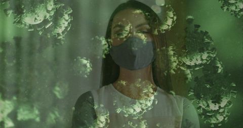Masked woman with green coronavirus overlay conceptual pandemic risk double exposure