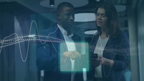 Diverse Business Professionals Analyzing Digital Data