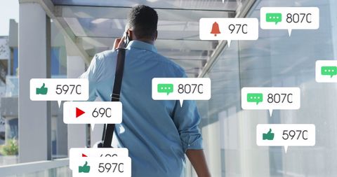 Businessman Engaged Online Walking through Airport