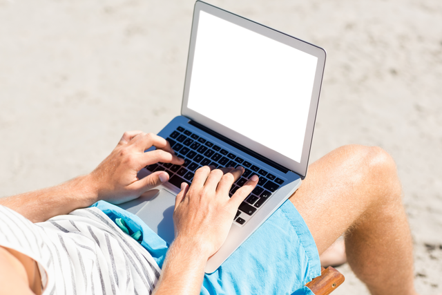 Midsection of Man Using Transparent Laptop at Beach - Download Free Stock Videos Pikwizard.com