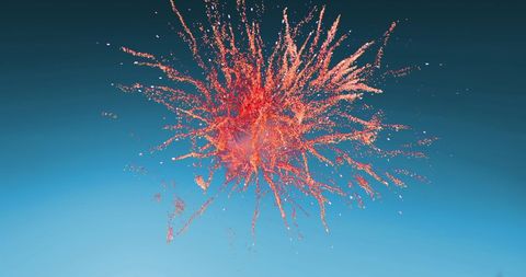 Vibrant Red Fireworks Exploding Against Blue Gradient Sky - Download Free Stock Images Pikwizard.com