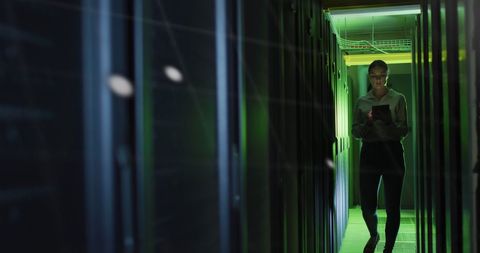 Engineer Monitoring Data Center in Server Room - Download Free Stock Images Pikwizard.com