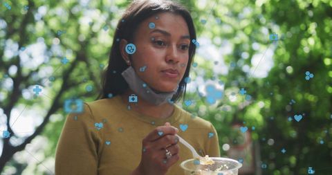 Woman Eating Salad Amid Digital Network Interface Overlay