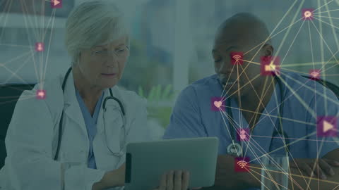 Healthcare Professionals Examining Digital Network Connections on Tablet