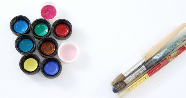 Assorted Watercolor Paints and Artist Brushes on White Background - Download Free Stock Images Pikwizard.com