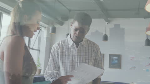 Diverse Business Team Discussing Work in Modern Office