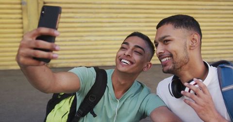 Friends Taking Selfie Outdoors on Urban Adventure